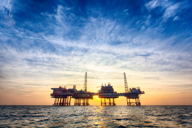Offshore oil and gas platform at sunset, UAE energy sector